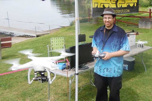 Alex Wright, owner and founder of Drone Depot demonstrated some of his DJI drones at the Sharbot Lake Farmers Market on July 19